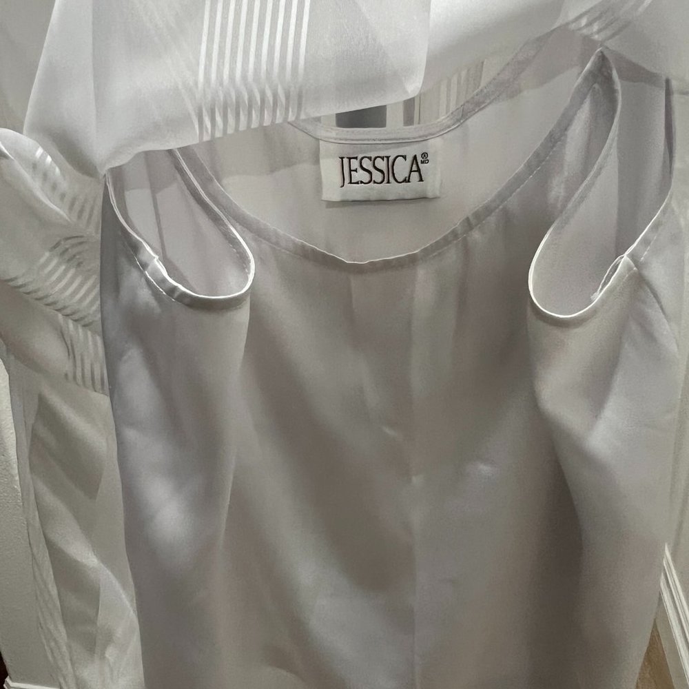 Jessica White on White off shoulder with silk cami